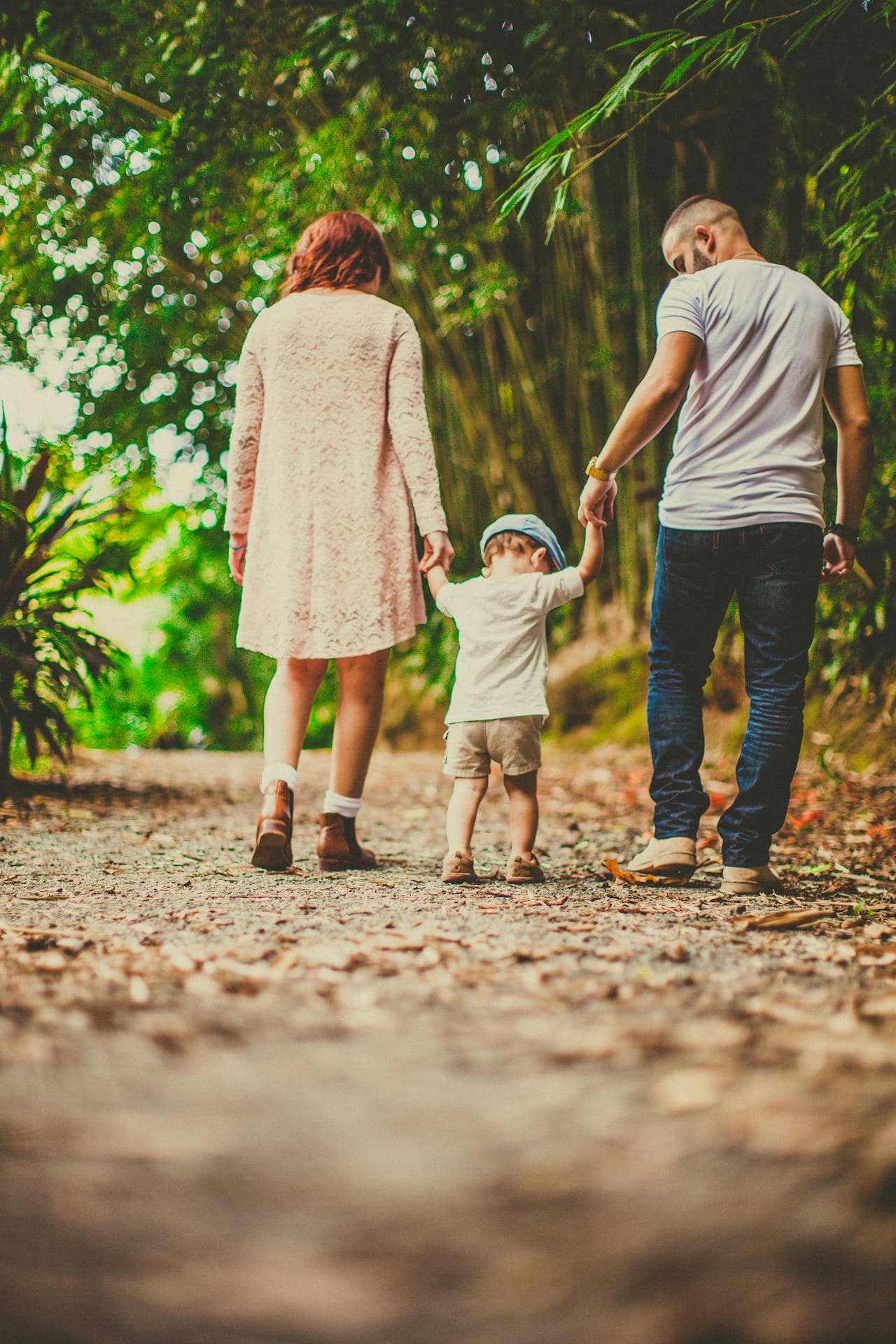 a family walking toward a golden hour sunset